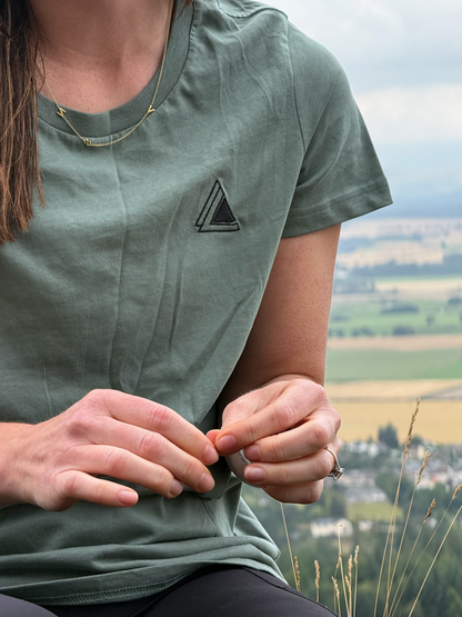 Close-up of the embroidered Stravaig logo on the chest of the Womens Everyday Trail T-Shirt in Machair Sage